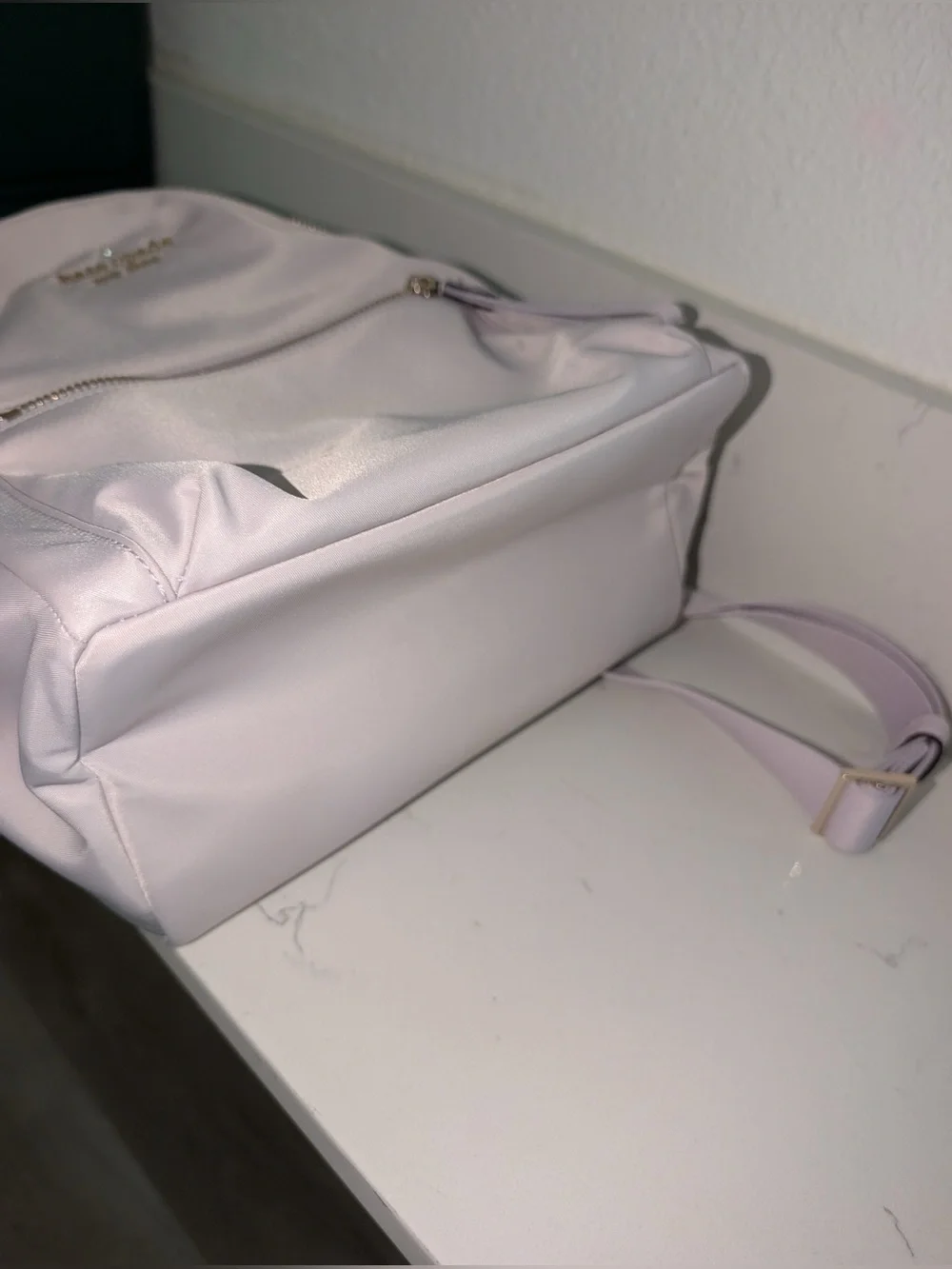 Kate Spade Chelsea Medium backpack in color Lilac Moonlight